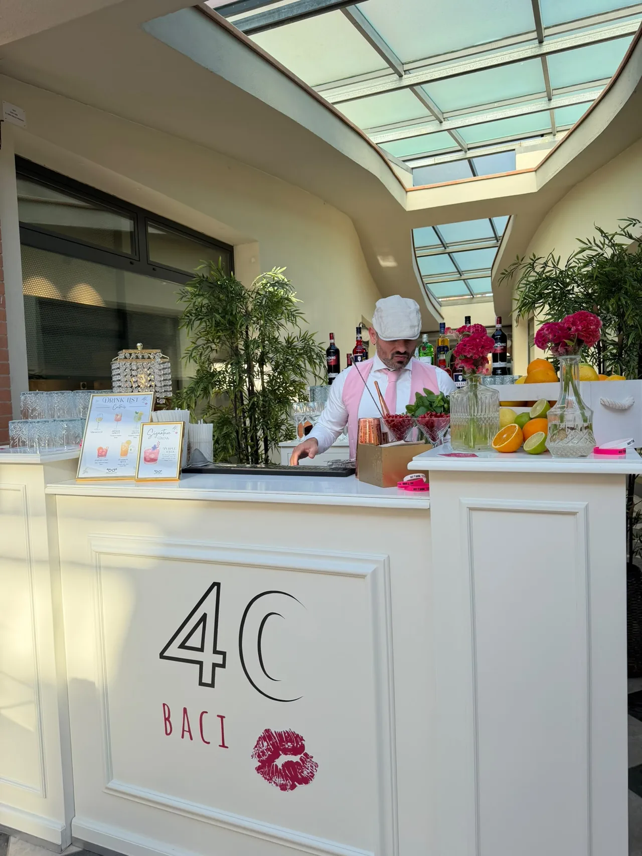 Bar counter branded for a company anniversary, with a signature cocktail on the drink list