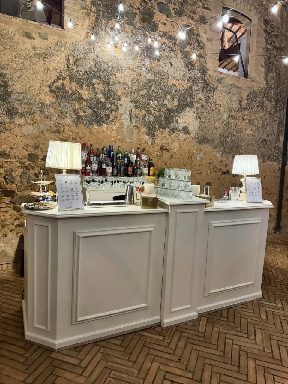 White wedding bar in the stone courtyard of a former convent in Montalcino