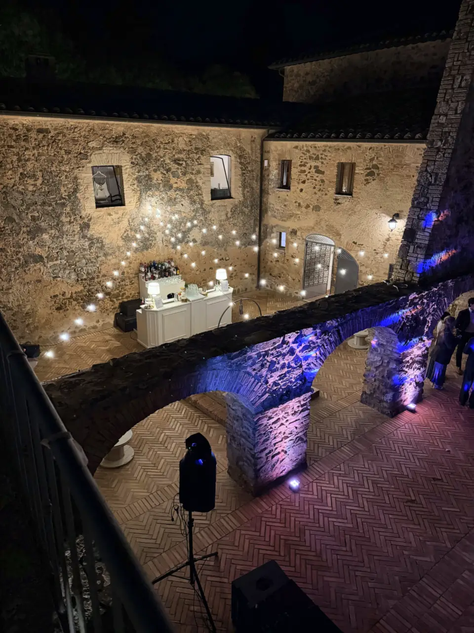 Night view from above of a wedding courtyard in Montalcino