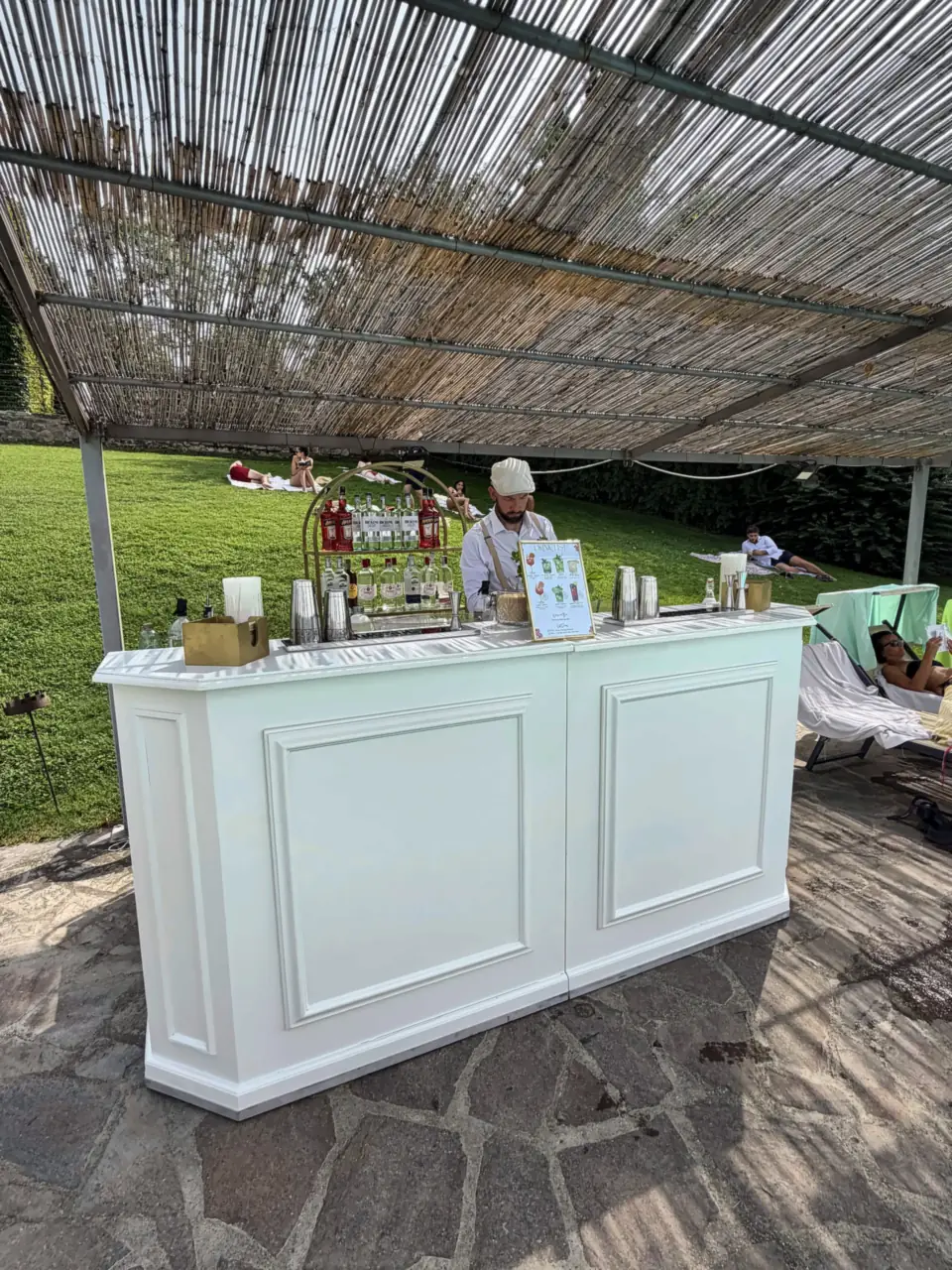 Daytime wedding bar under the pergola at Borgo di Castelvecchio, Val d'Orcia