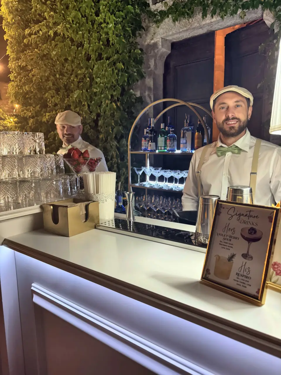 Just Drink bartender at the bar with the gold back bar