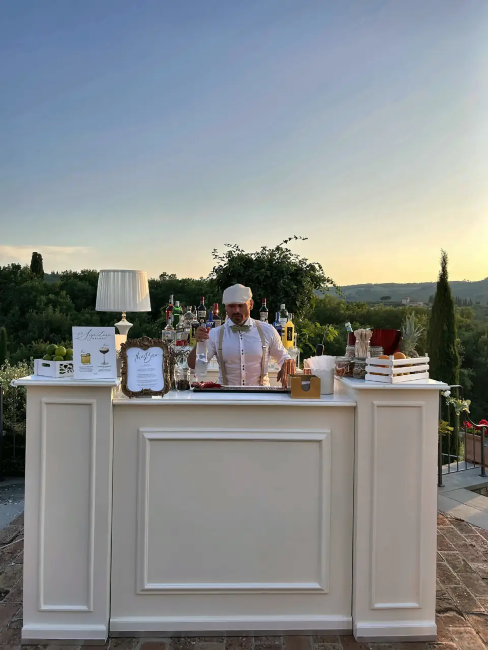 Just Drink bartender at the bar at sunset, Savignola Paolina