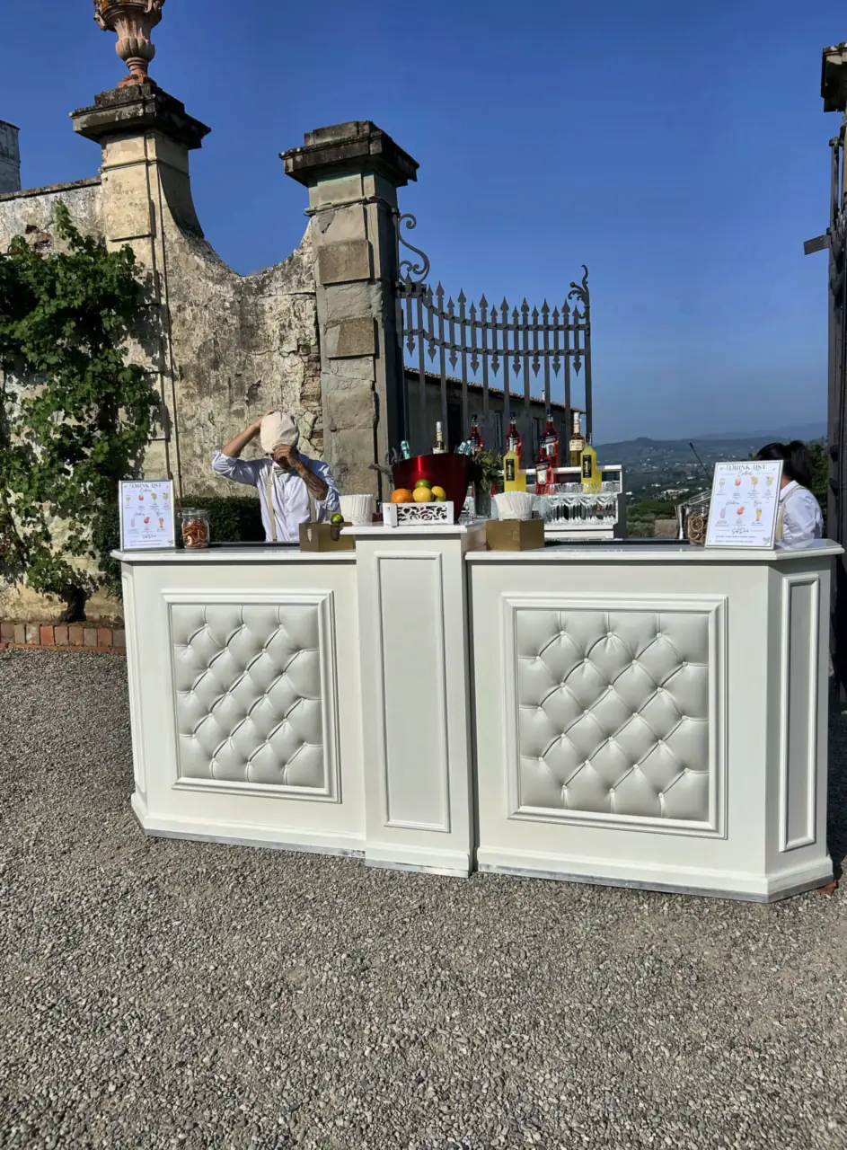 White bar in front of the gate of Villa Corsini